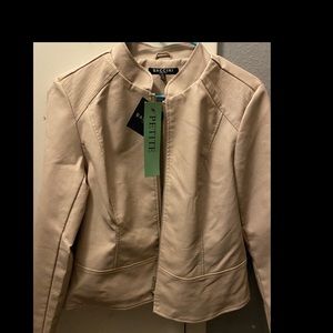 Never used faux leather jacket,  still has tags super cute !